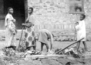 Quaker women weeding at Kibimba School