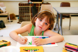 a girl working on a desk